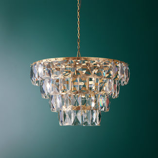 Four Tiered Conchita Chandelier in prismatic glass and brass