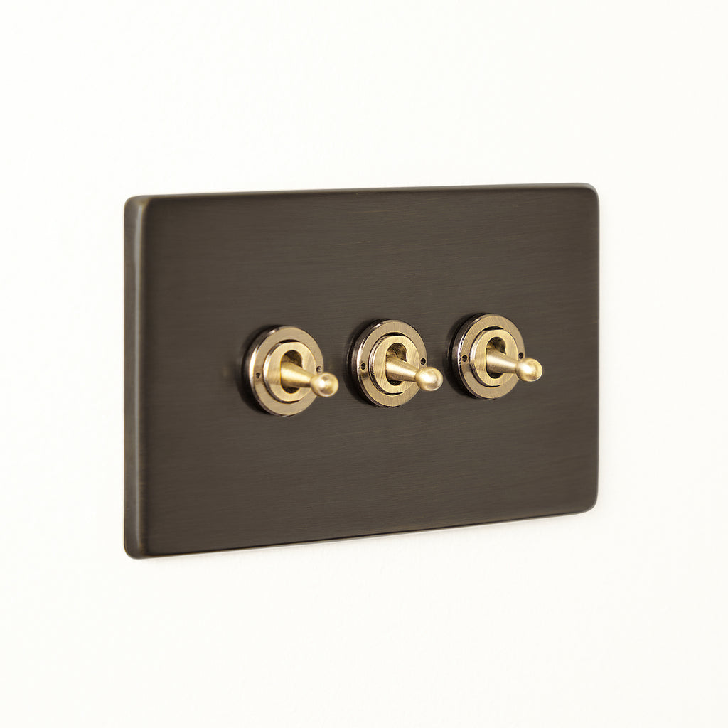 Three gang 2 way Florence toggle switch in bronze
