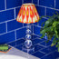Tiny Aurora rechargeable table lamp in clear
