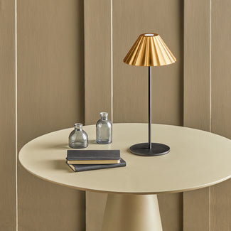 Twinky rechargeable table lamp in black with a brass hood