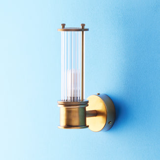 Smaller Hunter IP44 rated wall light in brass and glass