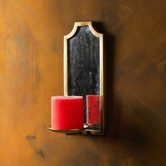 Kite wall mounted candle holder in antiqued brass