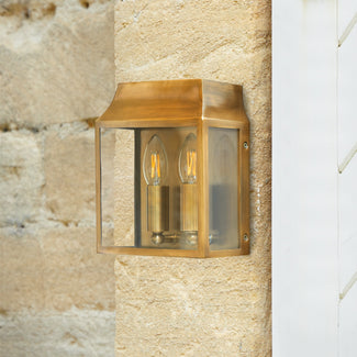 Double Crail IP44 exterior wall light in antique brass