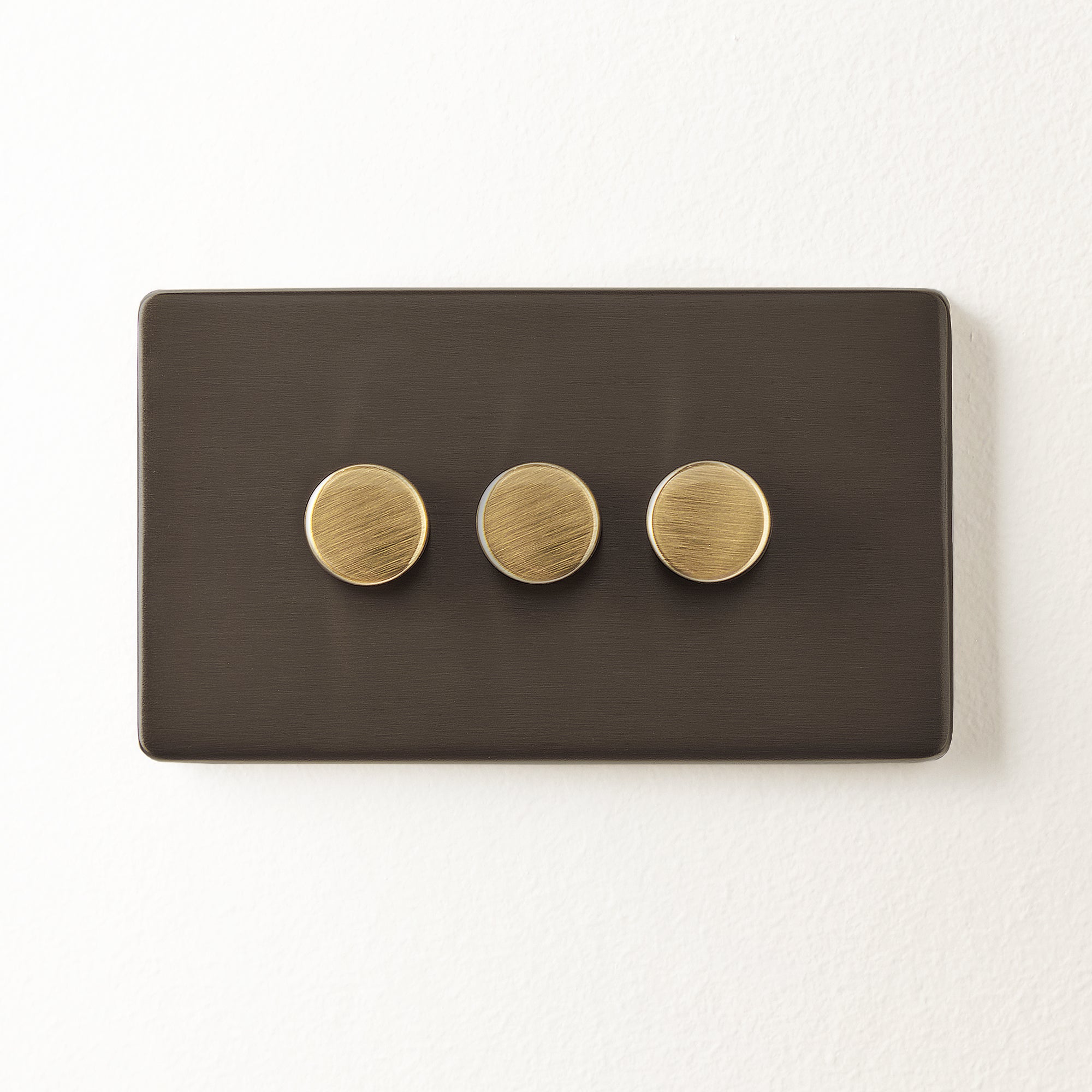 Three Gang 2 Way Florence Dimmer Switch In Bronze three-gang-2-way-florence-dimmer-switch-in-bronze