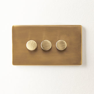 Three gang 2 way Florence dimmer switch in brass