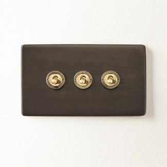 Three gang 2 way Florence toggle switch in bronze