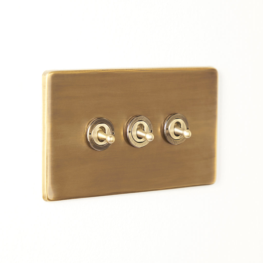 Three gang 2 way Florence toggle switch in brass