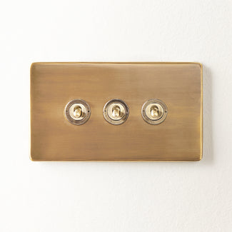 Three gang 2 way Florence toggle switch in brass