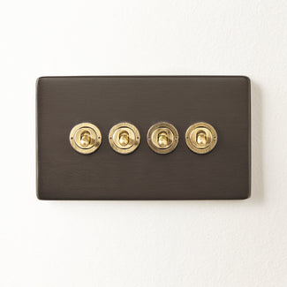 Four gang 2 way Florence toggle switch in bronze