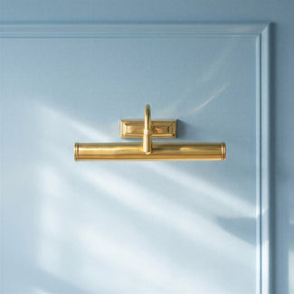 Smaller Clyfford picture light in waxed antique brass