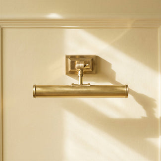 Smaller Pitcheroo picture light in antique brass