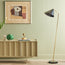 Galore floor lamp in brass with a black shade