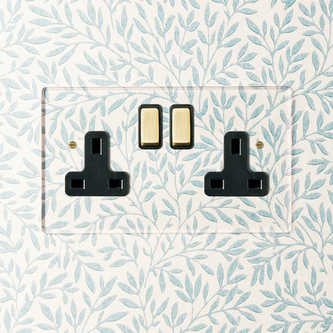 Lucian perspex double socket in clear perspex with black inserts and aged brass switch