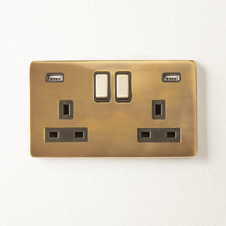 Florence two gang switched SP socket and dual USB outlet in brass