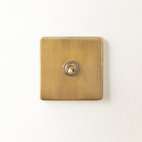 One gang intermediate Florence toggle switch in brass