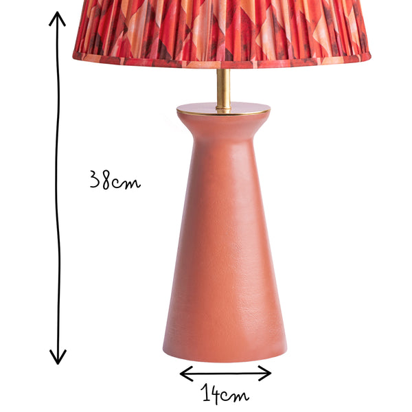 Cala table lamp in terracotta finish by Matthew Williamson
