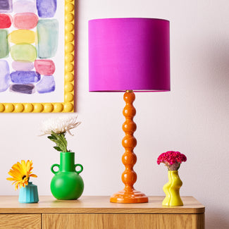 Lillee table lamp in burnt orange lacquered wood