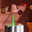 Cueva rechargeable table lamp in neon green by Matthew Williamson