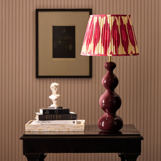 Smaller Wobster table lamp in burgundy lacquered wood