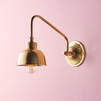 Carmel wall light in antiqued brass finish