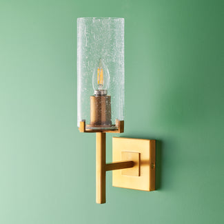 Frank wall light in brass and glass