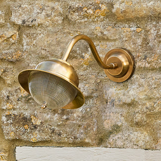 Holophane IP44 exterior wall light in brass