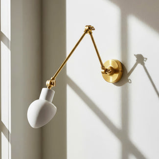 Nova wall light in brass and stone