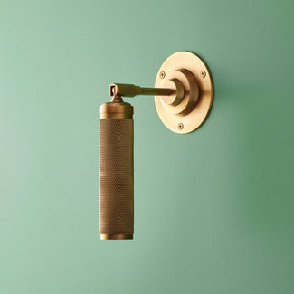 Quantum single wall light in antiqued brass