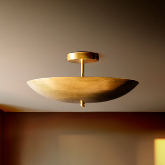Reflect flush ceiling light in hammered brass