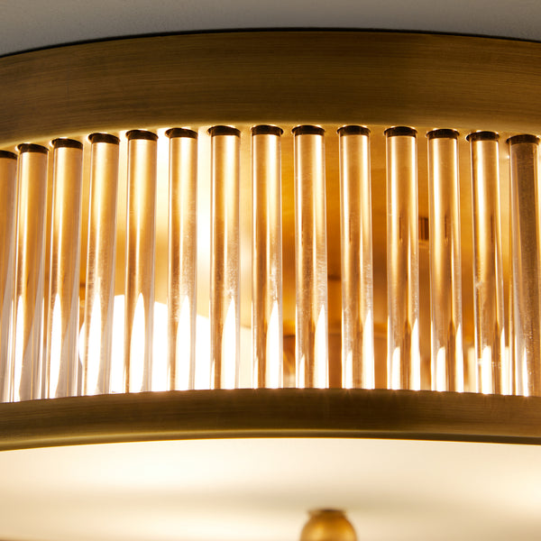 Round Roddy IP44 flush ceiling light in antique brass and clear glass