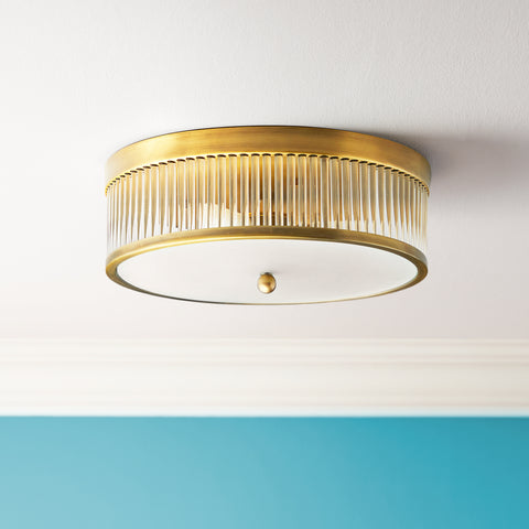 Round Roddy IP44 flush ceiling light in antique brass and clear glass