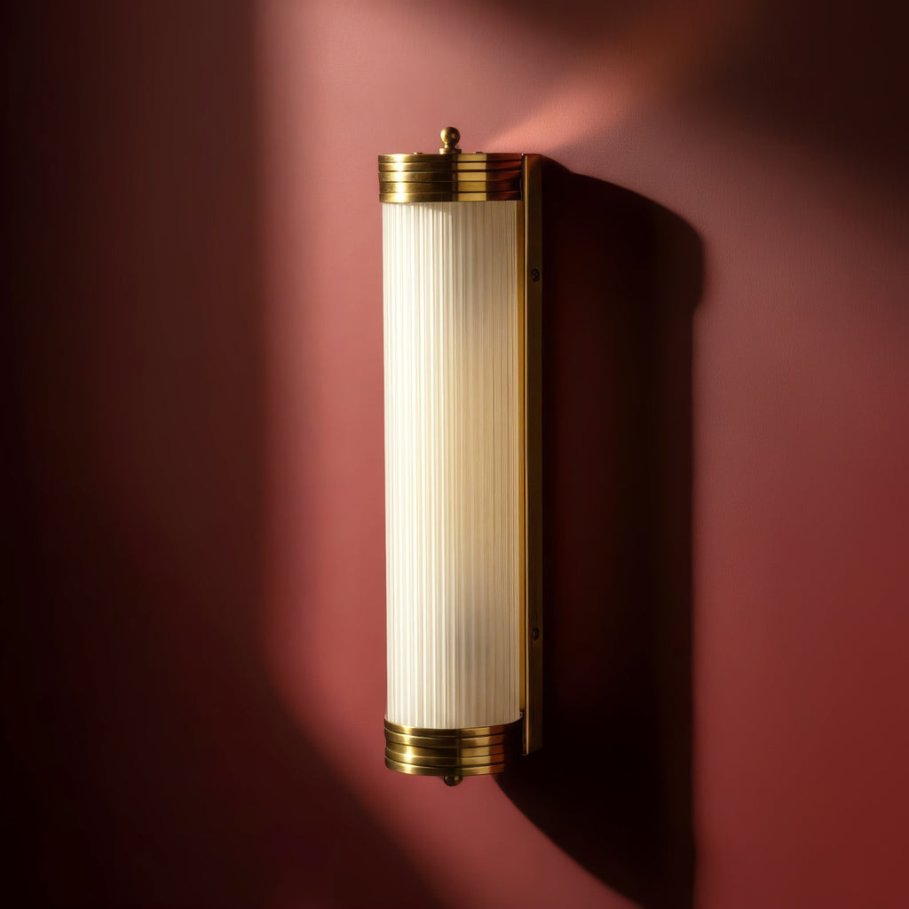 Long Roddy IP44 wall light in brass and frosted glass rods