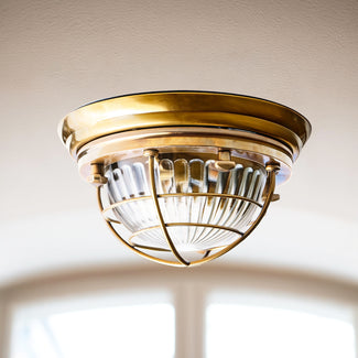Saturina IP54 flush light in brass and glass