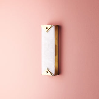 Theano wall light in alabaster and brass finish