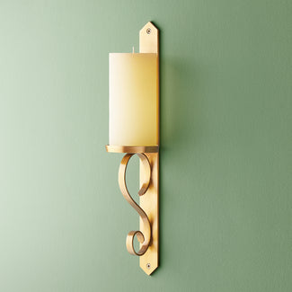 Tivoli wall mounted candle holder in antiqued brass