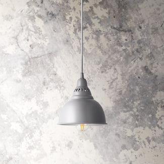Smaller Christie pendant light in poppy seed with stone interior