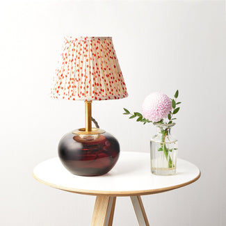 Tiddly Pomme table lamp in magenta