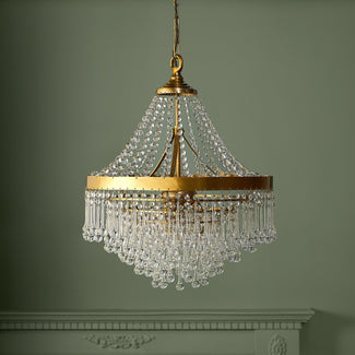 Capulet Chandelier in brass with clear blown glass droplets