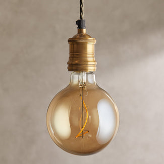 Extra Large globe 4 watt LED irregular filament bulb with amber coating and E27 fitting