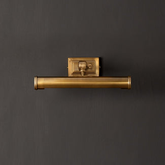 Smaller Pitcheroo picture light in antique brass