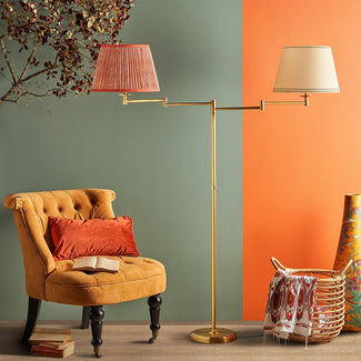 Double Swing standing lamp in antique brass