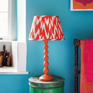 Lillee table lamp in wood with a orange finish