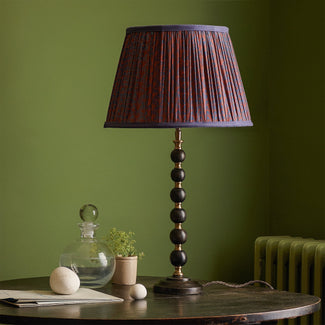 Smaller Rosie table lamp in wood and brass