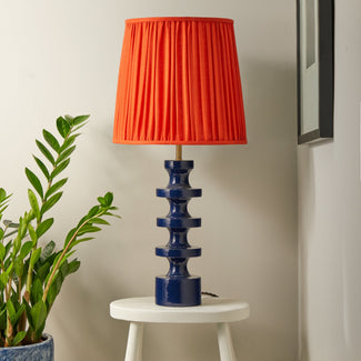 Spool table lamp in deep blue lacquered wood