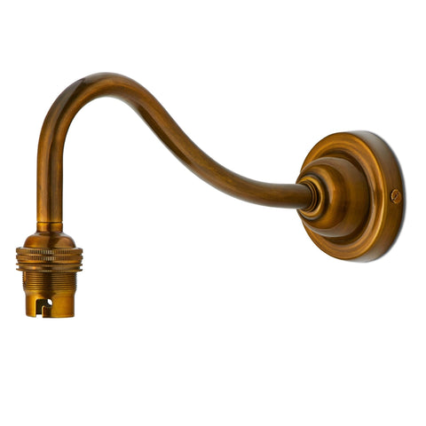 Swan neck wall fitting in antiqued brass