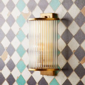 Roddy wall light in brass with glass rods