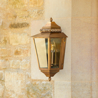 Westport IP44 exterior wall light in antiqued brass